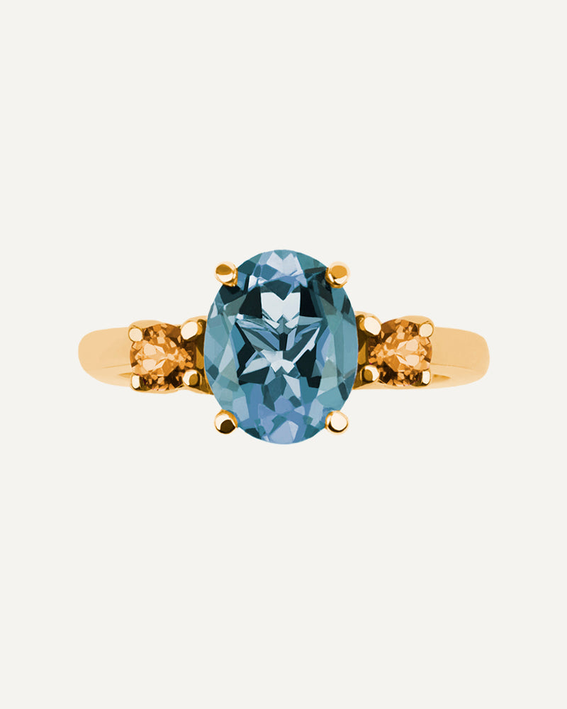 Anillo Luxe en plata de ley con topacio azul Sky y cuarzo citrino