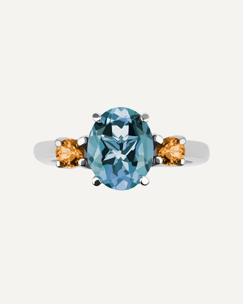 Anillo Luxe en plata de ley con topacio azul Sky y cuarzo citrino