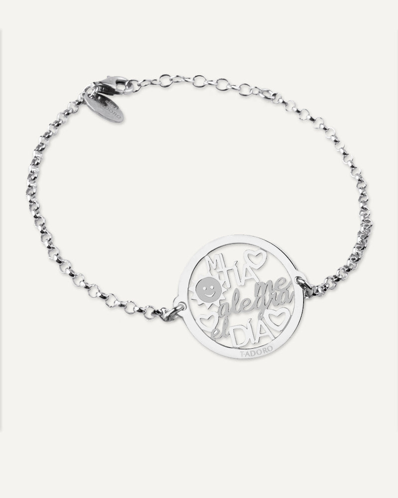 Pulsera "Mi tía me alegra el día" en plata de ley rodiada.