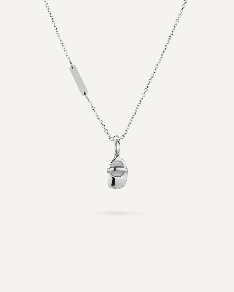 Collar nacimiento "Patuco bebé" en plata de ley rodiada.