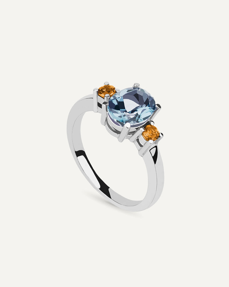 Anillo Luxe en plata de ley con topacio azul Sky y cuarzo citrino