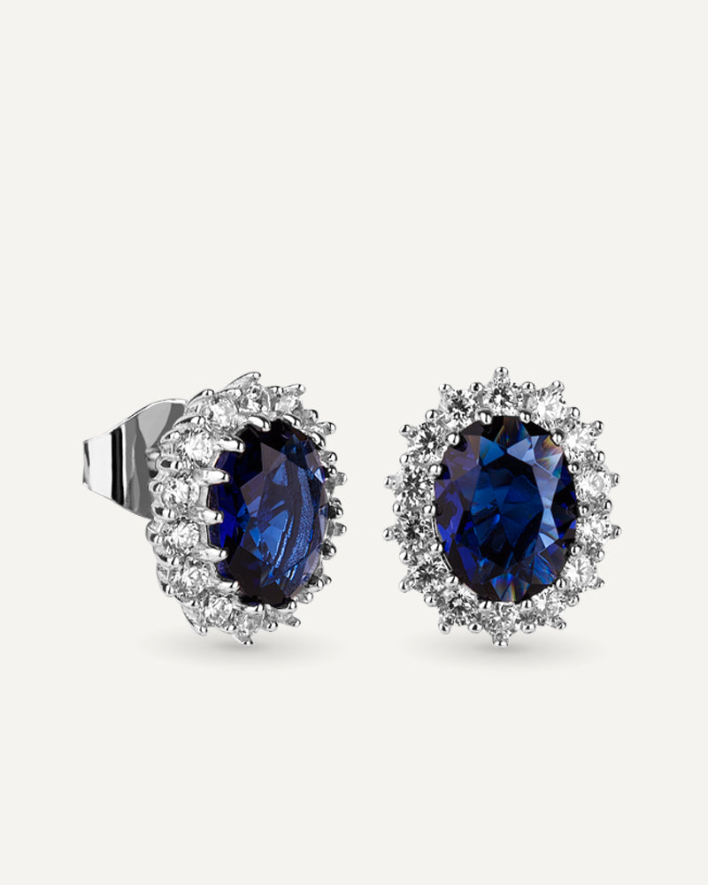 Pendientes BRILLIANT CUT en plata de ley con piedra azul central y circonitas Excellence star cut.