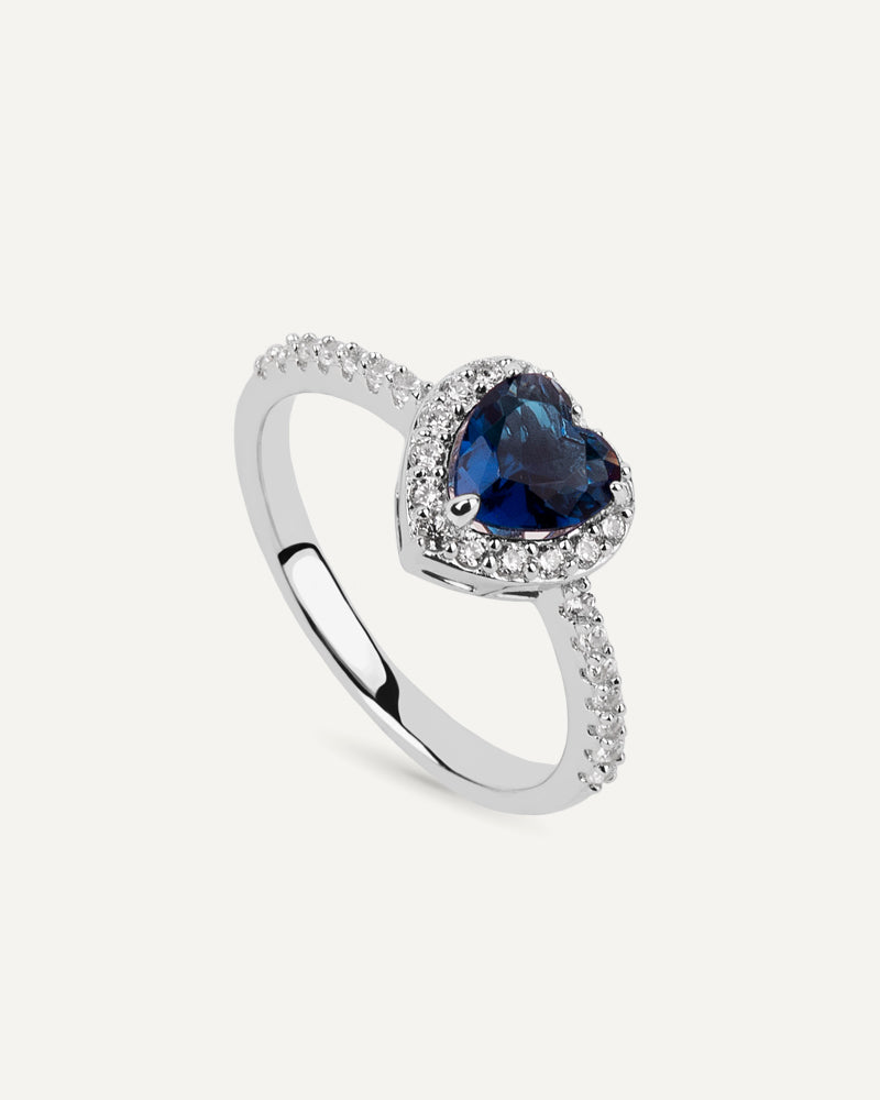 Anillo BRILLIANT CUT en garra en plata de ley con piedra azul y circonita Excellence star cut.