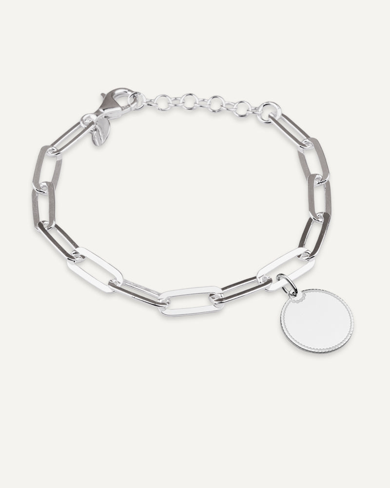 Pulsera con colgante personalizable en plata de ley.