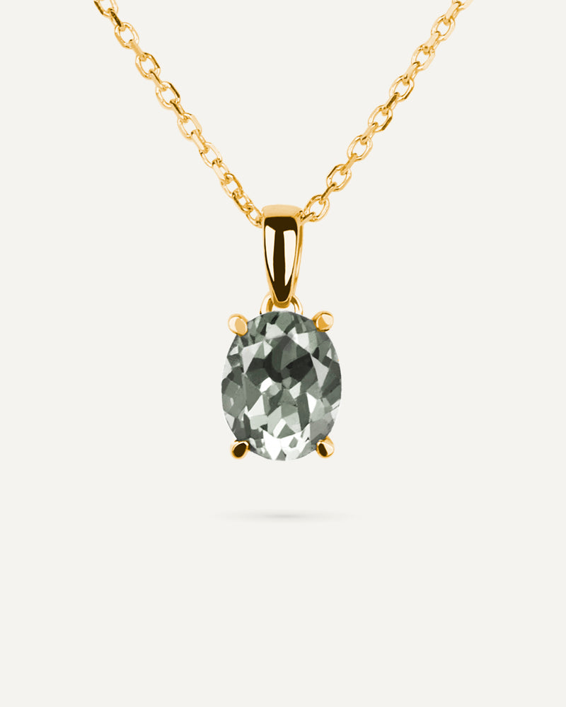 Collar Luxe en plata de ley con baño de oro y con amatista verde en talla oval.