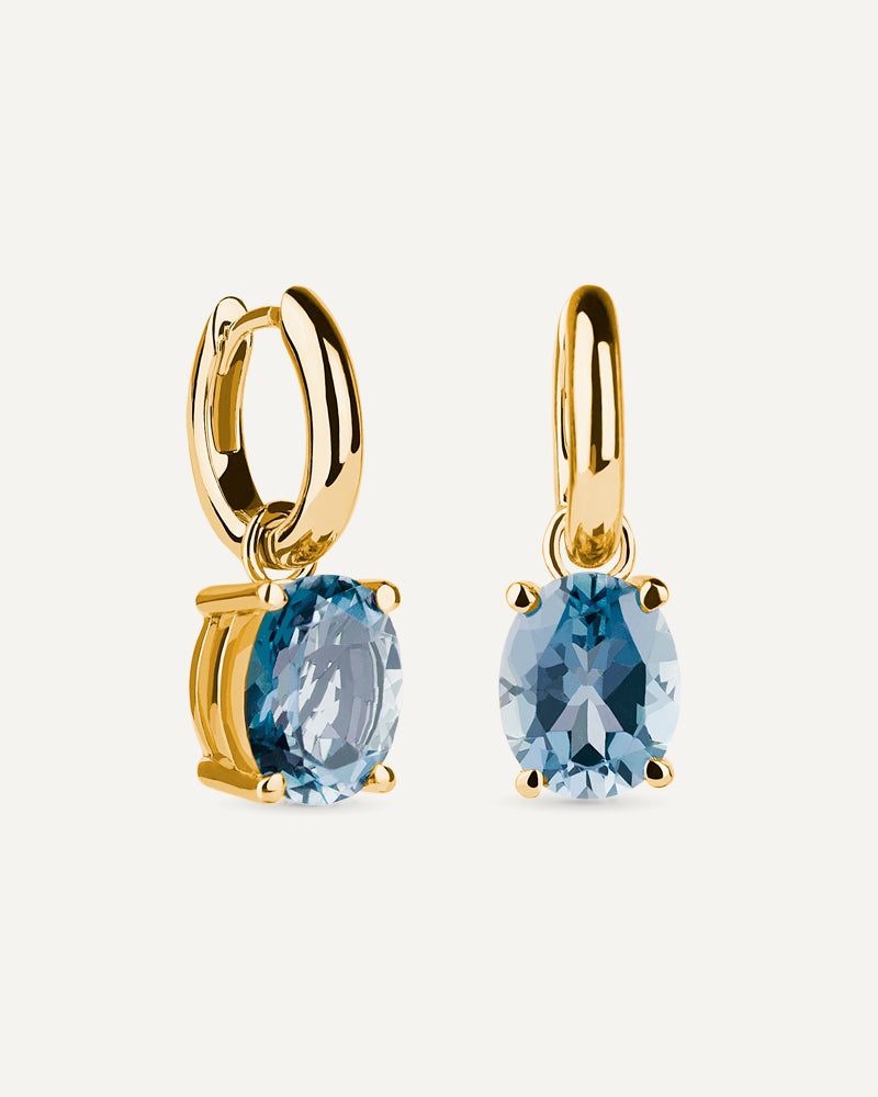 Pendientes Luxe en plata de ley bañada en oro con topacio azul Sky