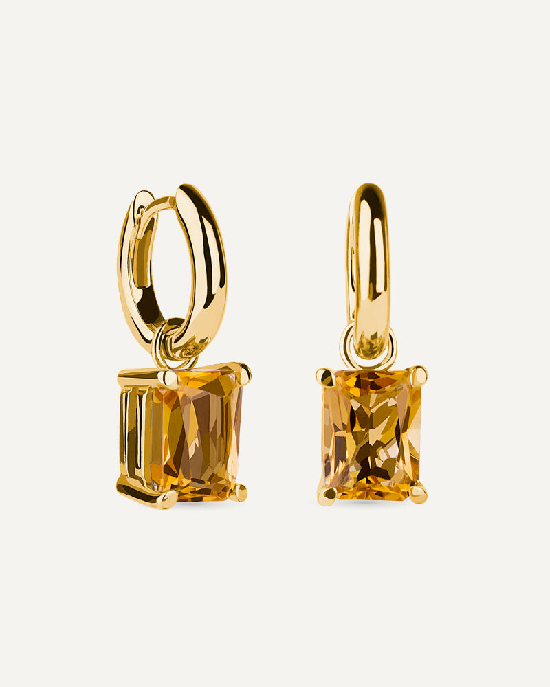 Pendientes Luxe en plata de ley con baño de oro y con cuarzo citrino en talla octogonal.