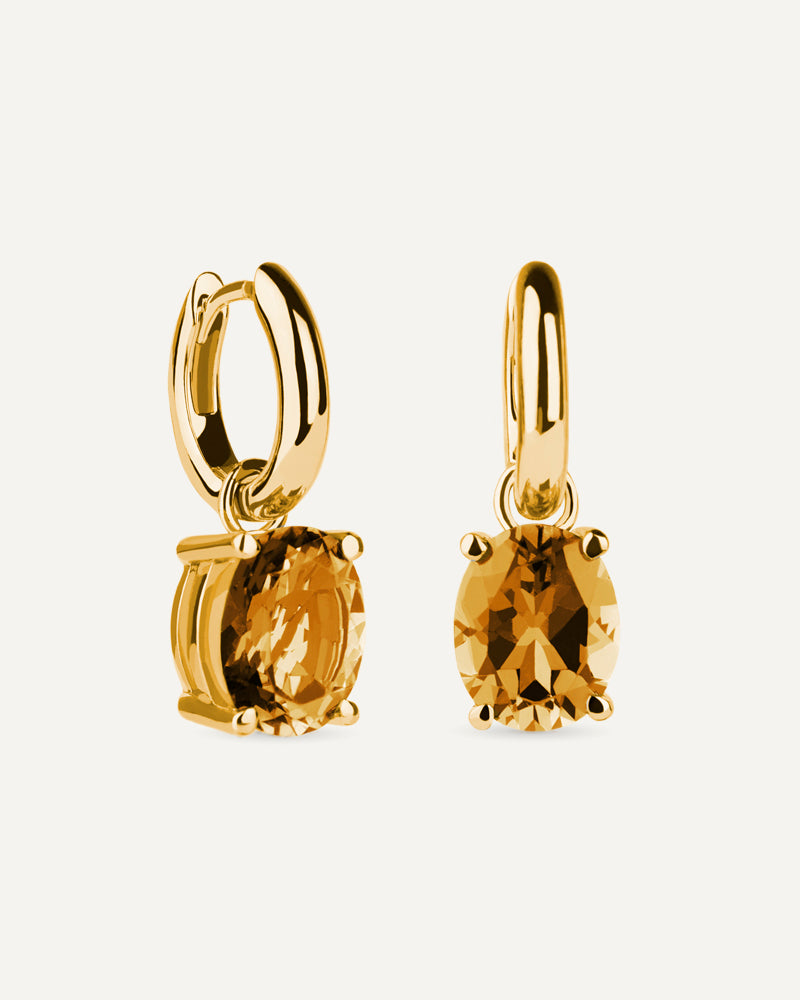 Pendientes Luxe en plata de ley con baño de oro y con cuarzo citrino en talla oval.
